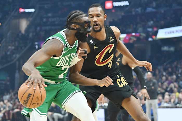 Mar 6, 2023; Cleveland, Ohio, USA; Boston Celtics guard Jaylen Brown (7) drives to the basket against Cleveland Cavaliers forward Evan Mobley (4) during the first quarter at Rocket Mortgage FieldHouse. Mandatory Credit: Ken Blaze-USA TODAY Sports